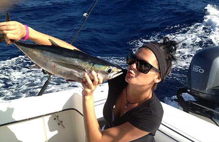 Cassy kissing a fish